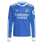 Real Madrid blue football jersey with Emirates Fly Better sponsor and crest on the chest.