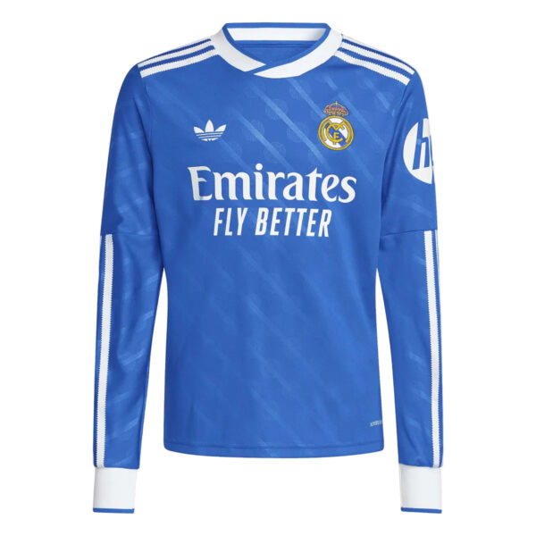 Real Madrid blue football jersey with Emirates Fly Better sponsor and crest on the chest.
