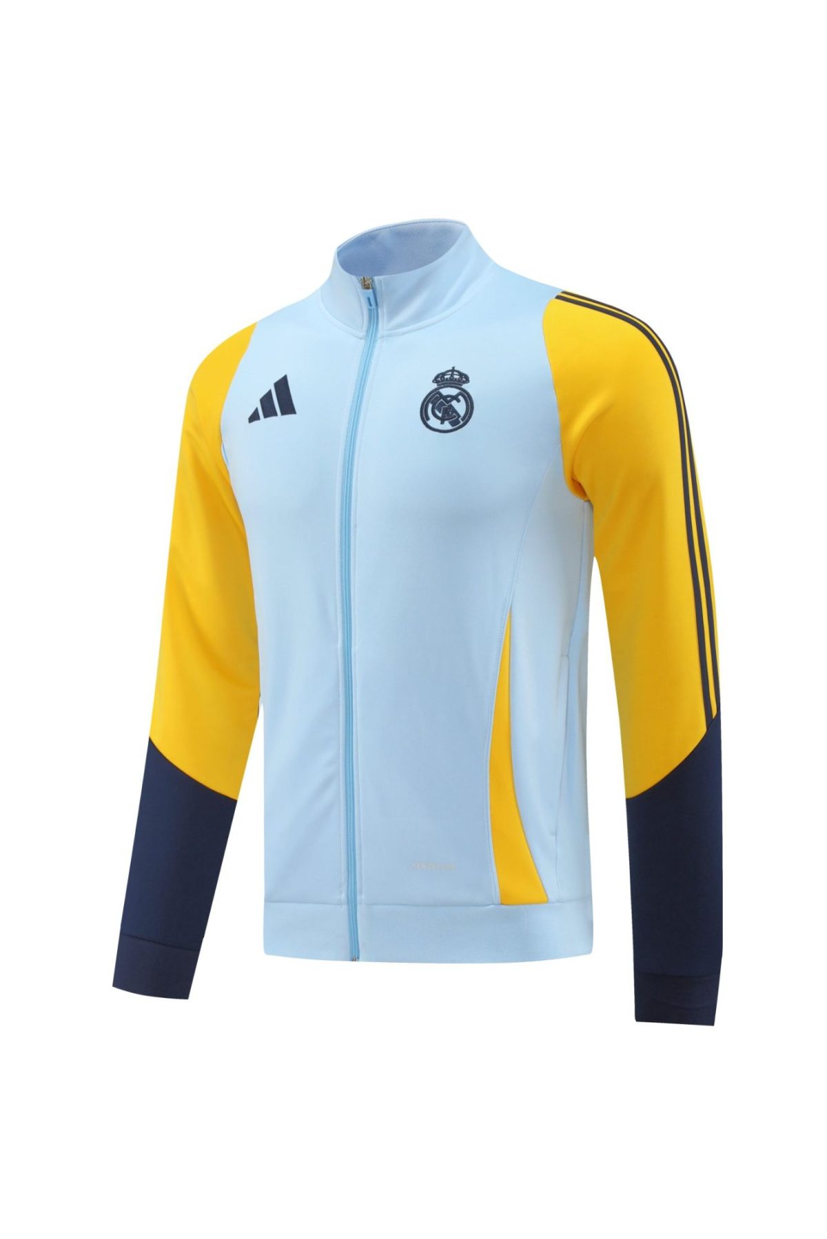Light blue Real Madrid training jacket with yellow sleeves, front zipper, and team crest on the chest