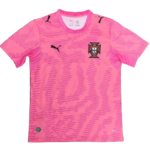 Pink Portugal national team football jersey with Puma logos and crest, short sleeves, tiger-stripe pattern on the fabric