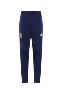 11ab628b | UAE SPORT STORE Navy blue athletic track pants with a yellow club crest on the left thigh and a yellow Adidas logo on the right thigh.