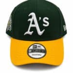 Adjustable green and yellow baseball cap with Oakland A's logo.