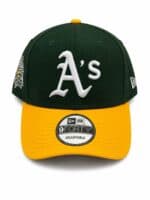 Adjustable green and yellow baseball cap with Oakland A's logo.