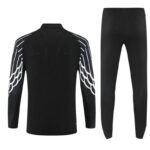 Black athletic tracksuit jacket and pants set with white wing-like stripes along the sleeves, viewed from the back.