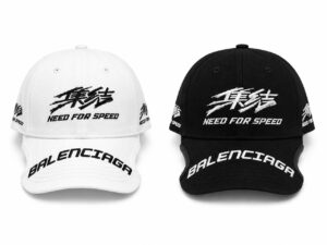 White and black Balenciaga baseball caps, front embroidery reads 'Need for Speed' with 'BALENCIAGA' on the brims.