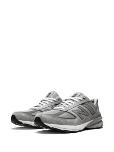14105633_33201805_1000_f277b04b-af35-45b9-b6bf-3e1d11d6f991 | UAE SPORT STORE Pair of gray athletic sneakers with mesh and suede overlays, shown from a front-left angle.