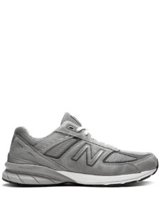 14105633_33204598_1000_63686a57-cc8f-4167-8dc3-66c45b914c8a | UAE SPORT STORE Grey athletic sneaker with mesh panels and suede overlays, New Balance logo on the side.
