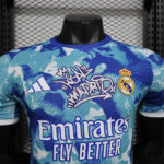 Mannequin wearing a blue Real Madrid football jersey with Emirates Fly Better sponsor and club crest.