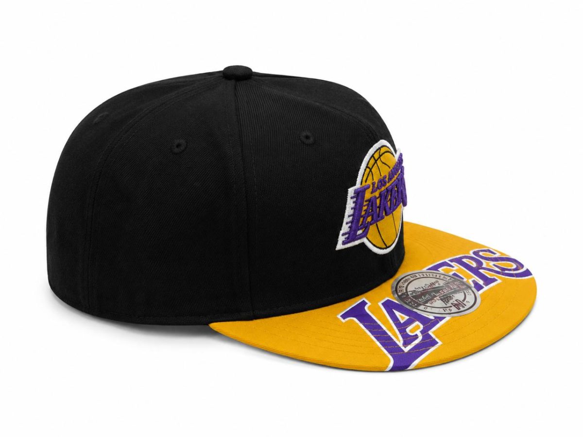 Black baseball cap with Lakers logo on the front and a yellow brim/bill