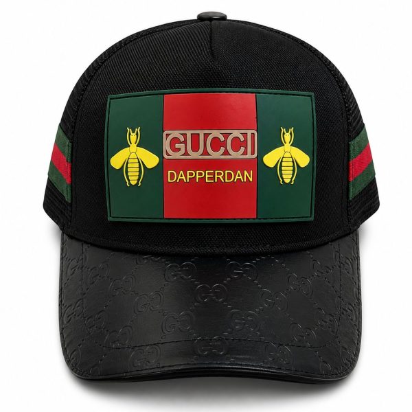 Black baseball cap with a green-red-green Gucci patch featuring yellow bees and the text 'GUCCI DAPPERDAN' on the front panel