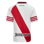 Rear view of a white soccer jersey featuring a bold red diagonal sash, red striped sleeves, and sponsor logos (DIRECTV) at the bottom edge.