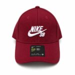 17552a69-428a-417c-837a-a8c89d007cc1 | UAE SPORT STORE Red Nike SB baseball cap with white embroidered logo on the front panel(s).