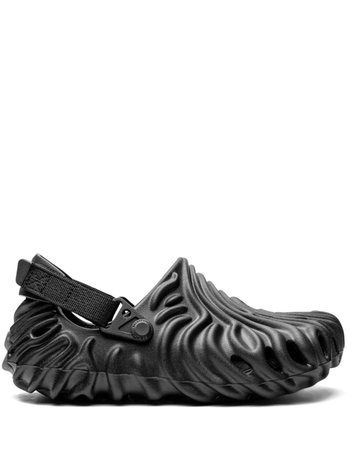 Black textured water shoe with an adjustable strap and buckle, shown from the side.