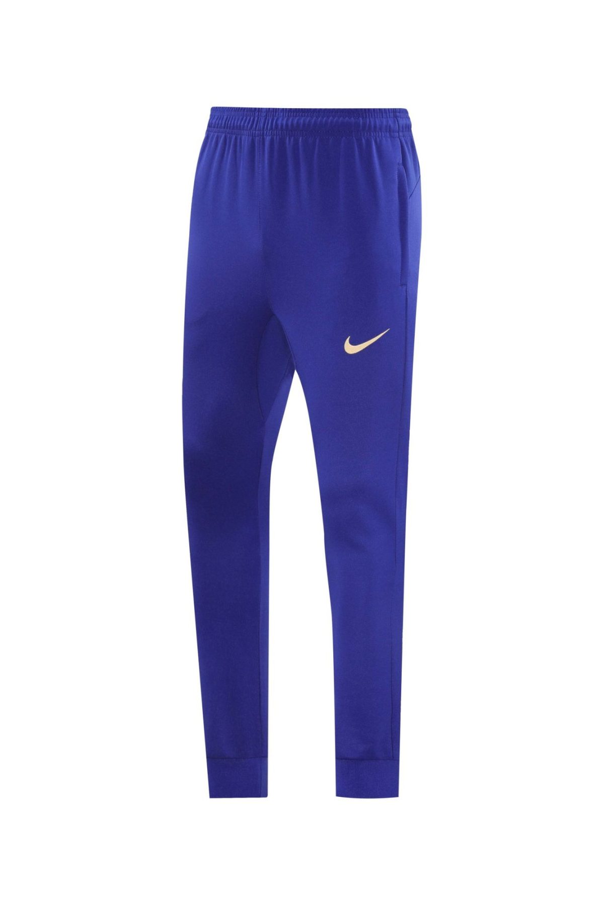 Royal blue Nike athletic pants with a gold swoosh on the left thigh, shown from waist to ankles.