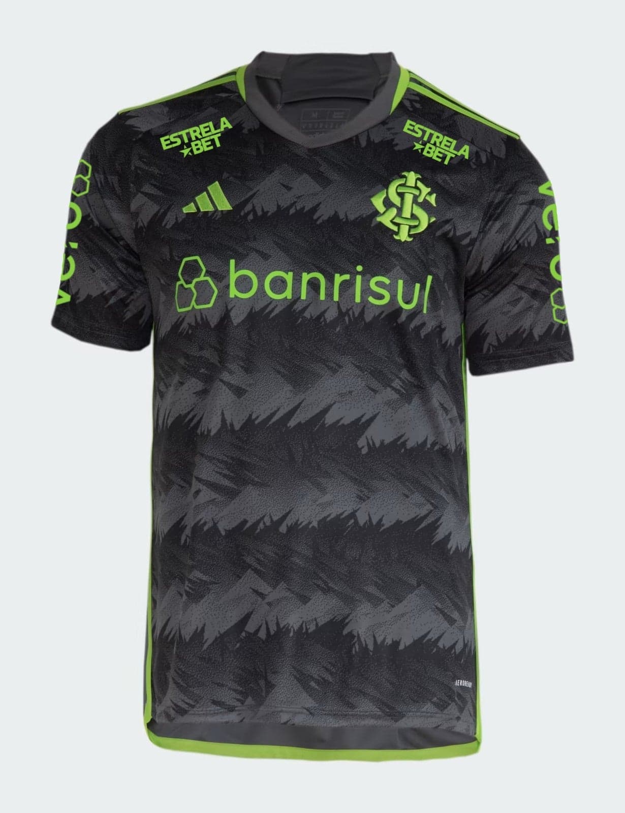 1YVQDQm1Fayr0eY_b8ef841a-be18-4268-934f-68ac0aeabb61 | UAE SPORT STORE Front view of a black-gray camouflage-pattern soccer jersey with neon green trim and sponsor logo 'banrisul' across the chest.