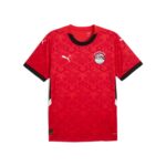 Red Puma football jersey with black collar and all-over geometric pattern, featuring the Egypt Football Association crest on the chest and white Puma logos on the shoulders and sleeve