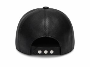 Rear view of a black leather cap with an adjustable strap and silver snap buttons on a white background