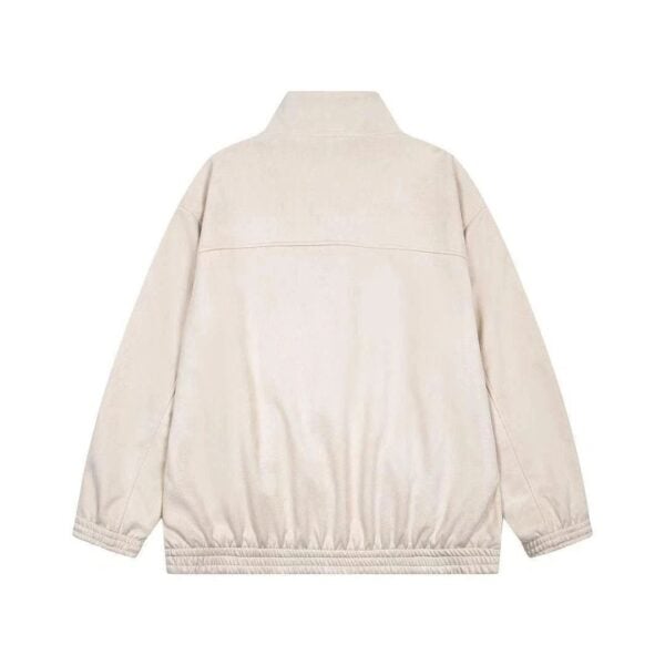 Beige windbreaker jacket viewed from the back, with elastic hem and cuffs, simple collar, loose fit.