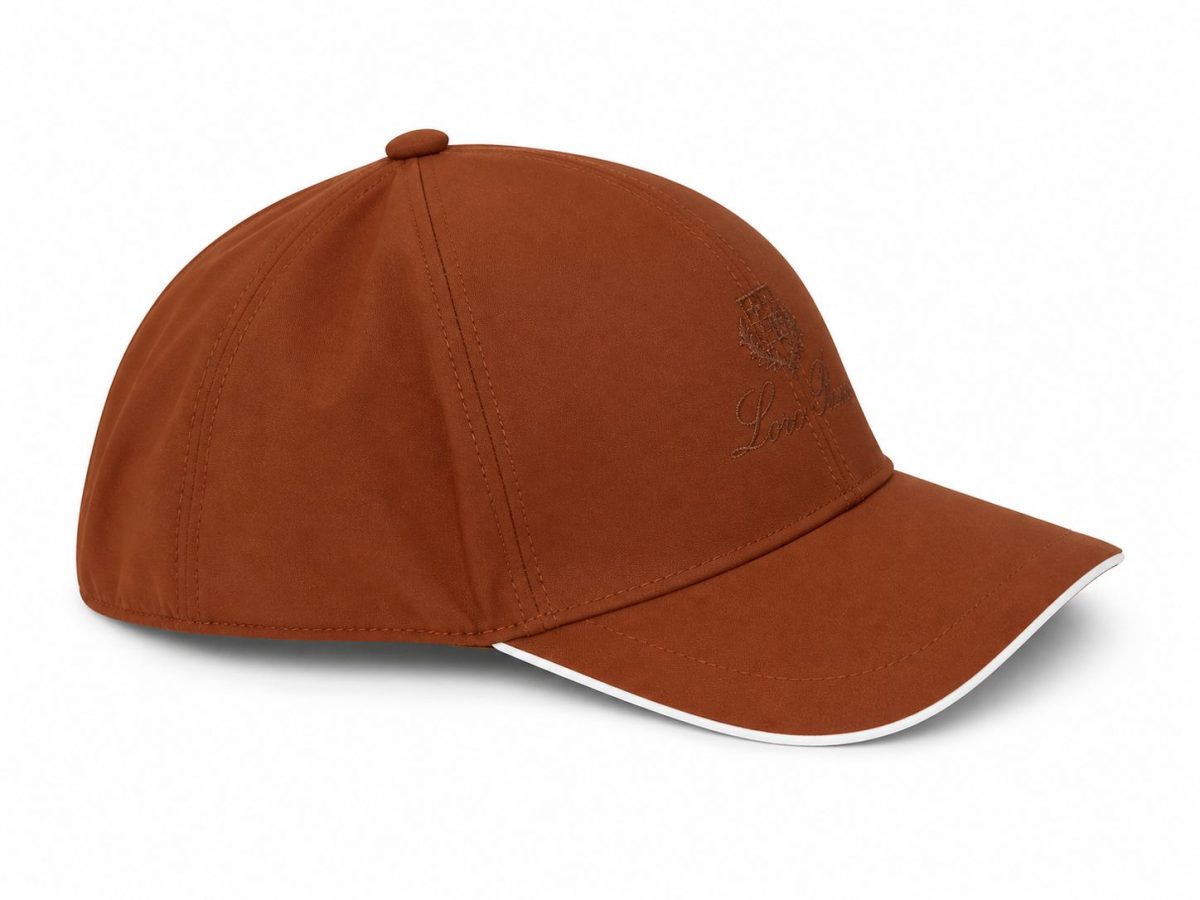 Brown baseball cap with stitched front logo and a curved brim, single-tone cotton look.