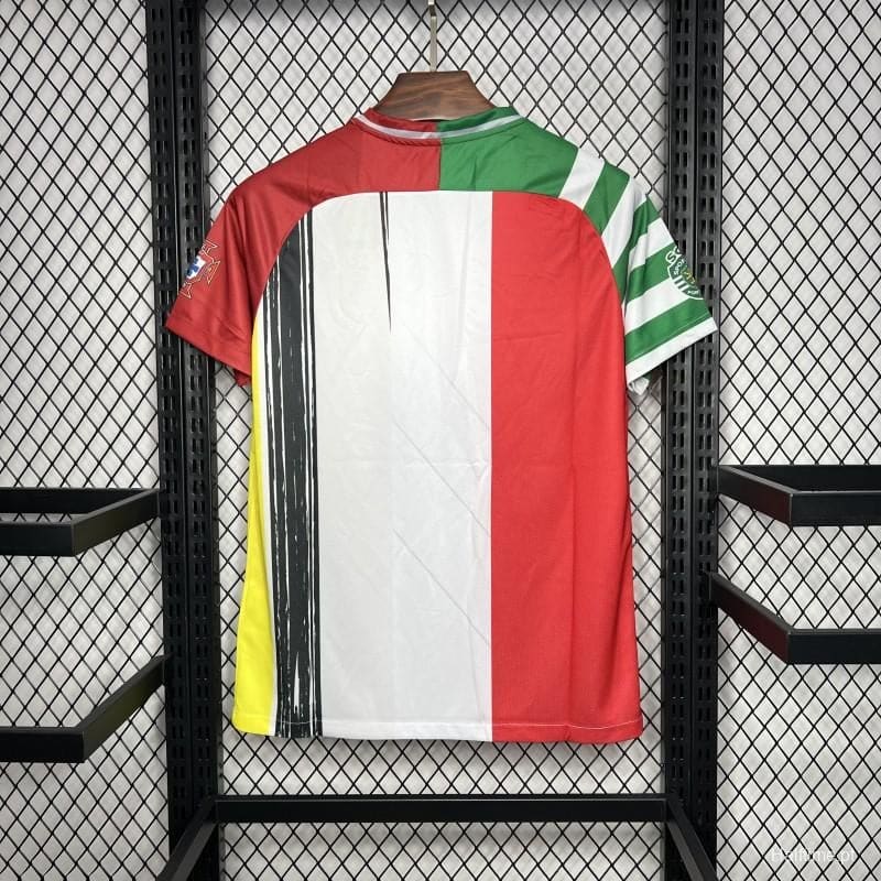 1c52dda228581674 | UAE SPORT STORE Back view of a colorful sports jersey on a wooden hanger, displaying red, white, and green vertical panels with a black brush stripe and a yellow side panel, hanging on a metal grid wall.