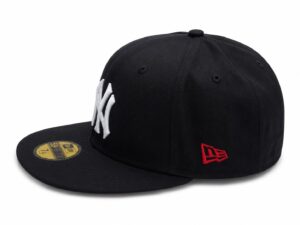 1d07bb3f-f44d-43ee-8e01-40b8b3921b76 | UAE SPORT STORE Black baseball cap with a white raised NY logo on the front, red New Era logo on the side, and a gold sticker on the brim.
