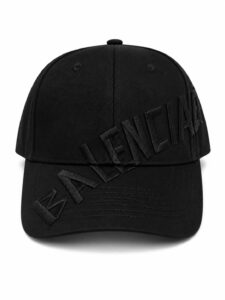 Black baseball cap with large raised lettering spelling ELEMENTAL along the front of the crown and brim.