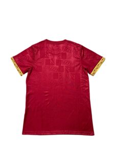 1fd35ba5 | UAE SPORT STORE Red short-sleeve T-shirt with yellow patterned cuff trim featuring a geometric design on the sleeves (back view).