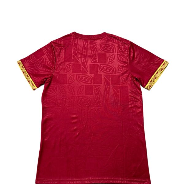 Red short-sleeve T-shirt with yellow patterned cuff trim featuring a geometric design on the sleeves (back view).