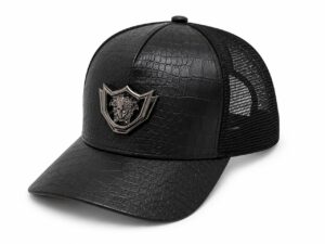 Black leather-look crown cap with metallic emblem.