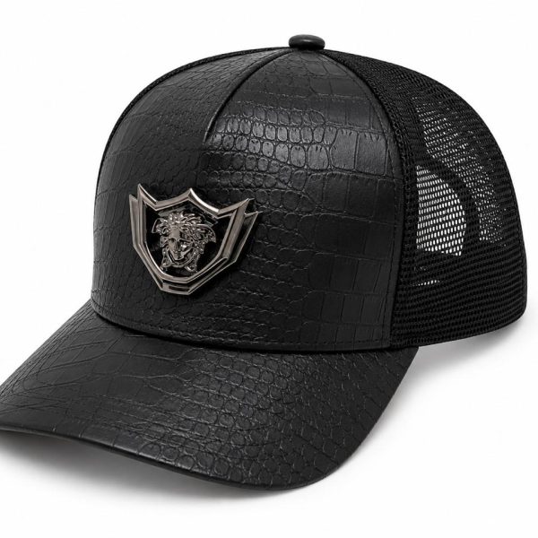 Black trucker cap with a faux crocodile-embossed front and a silver lion crest badge on the front panel, plus a mesh back.