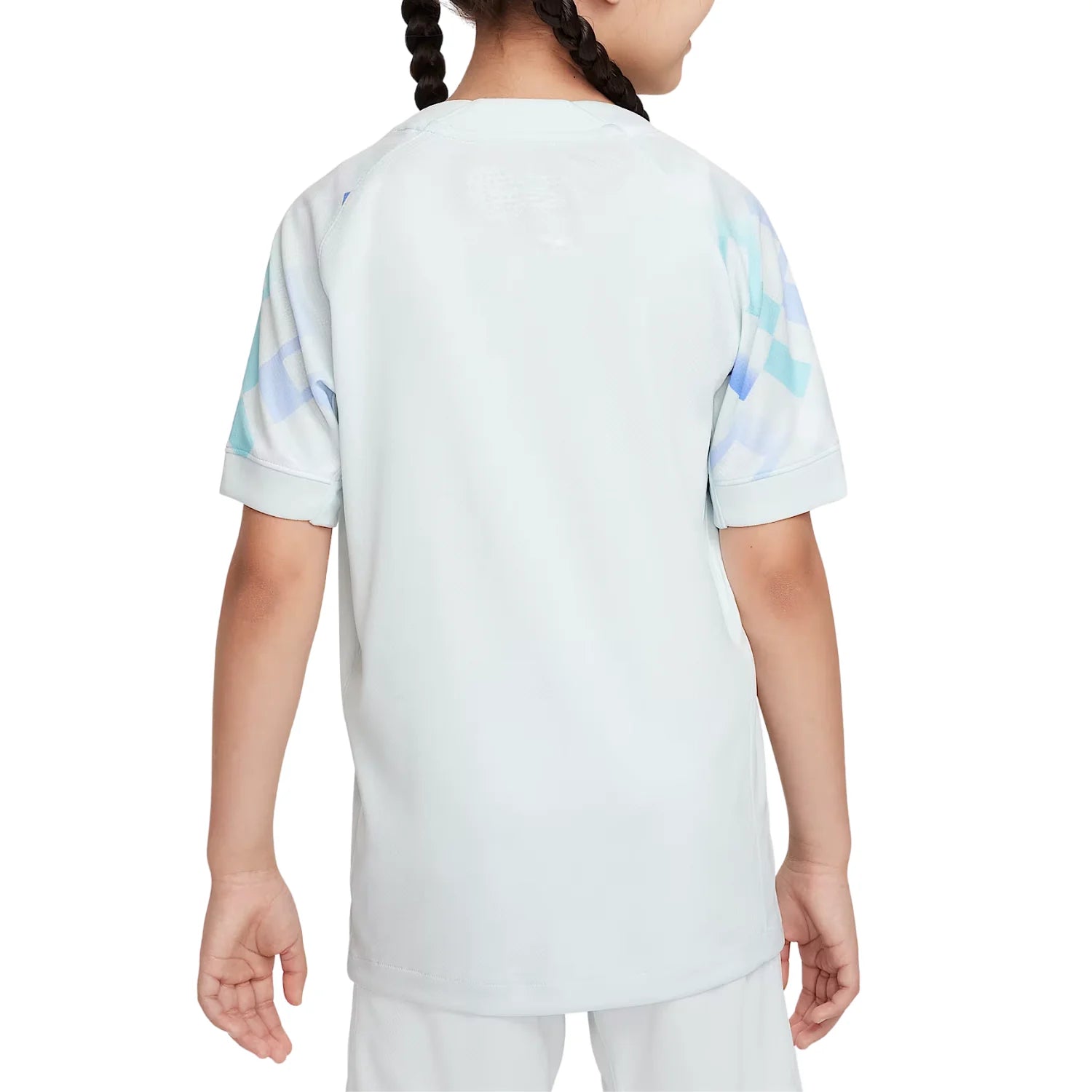 20_e7262518-4caa-4a07-b22c-d57e917212b3 | UAE SPORT STORE Back view of a child wearing a light pastel blue top with short sleeves and subtle geometric pastel-patterned panels on the sleeves.