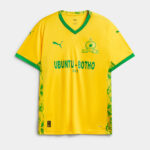 Yellow soccer jersey with green trim and crest, featuring Puma logo and the text 'UBUNTU - BOTHO S&E' across the chest.