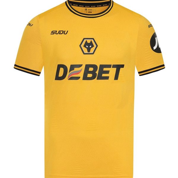 Bright yellow football jersey with black trim, DEBET sponsor across chest, and wolf crest above the logo.
