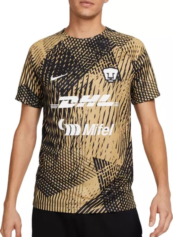 22NIKMWSPMS22PR3RREA_06da75a2-0bab-440a-951d-4e6f5c5c79c3 | UAE SPORT STORE Tan and black abstract-pattern soccer jersey with Nike swoosh, crest on chest, and sponsor logos DHL and Mifel, worn by a model.