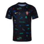 Black Portugal football jersey with a colorful geometric pattern, Nike swoosh, and team crest on the chest.