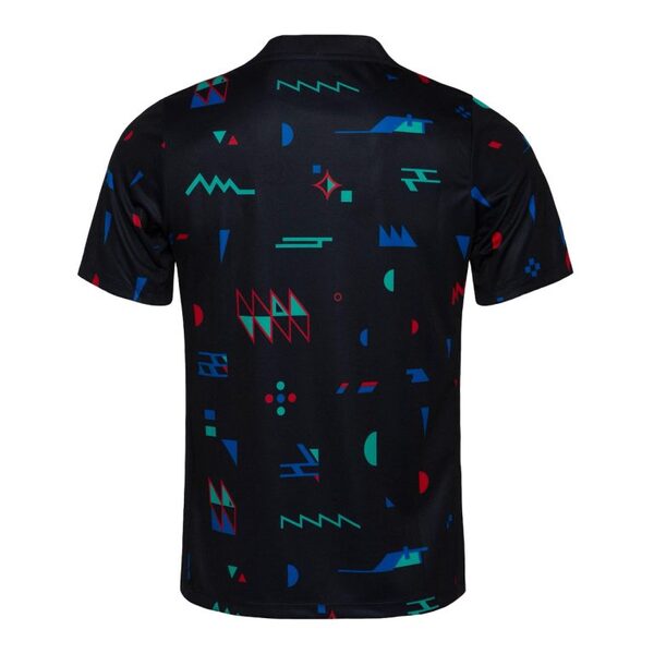 Black short-sleeve t-shirt featuring a scattered teal, red, and blue geometric abstract pattern.