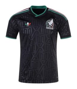 Black Mexico national soccer jersey with teal trim and geometric pattern; crest on left chest and Adidas logo on right.