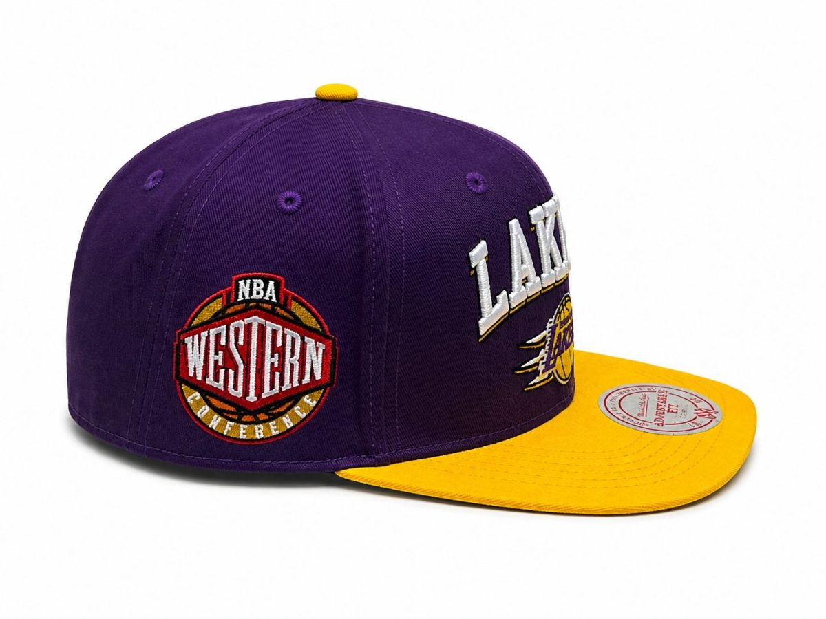 Purple Los Angeles Lakers cap with a bright yellow brim and yellow top button, featuring Western Conference patch on the side.