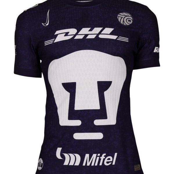 Dark purple sports jersey with a large white skull emblem on the chest and DHL/Mifel sponsor logos visible across the front.