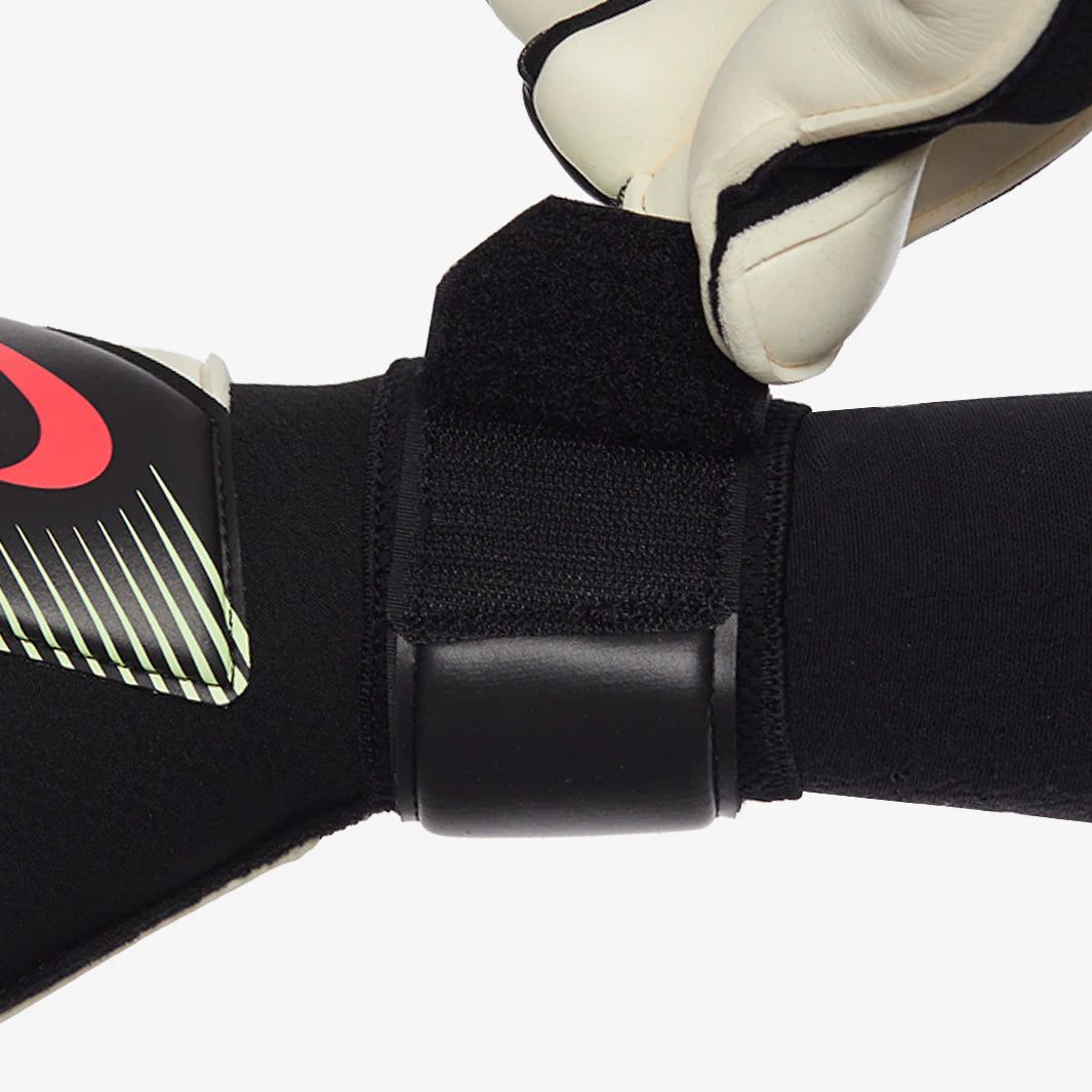 270046_Gallery_3_1348445 | UAE SPORT STORE Close-up of a black sports strap with Velcro being fastened, showing a plastic buckle and a red logo on the left.