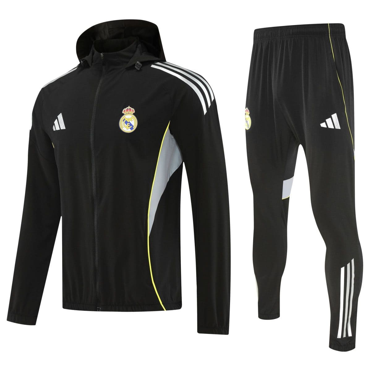 Black Real Madrid tracksuit jacket and pants with white stripes and crest showing on the chest leg logo.
