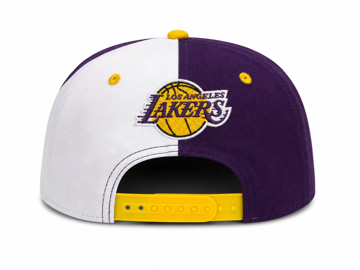 Back view of a Los Angeles Lakers cap split white left and purple right, with a yellow logo and a yellow adjustable strap visible at the back