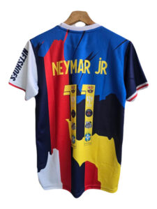 Neymar Jr football jersey hanging on a wooden hanger with a bold blue, red, yellow color-block design and Neymar Jr text on the back, number 10 panels in the center