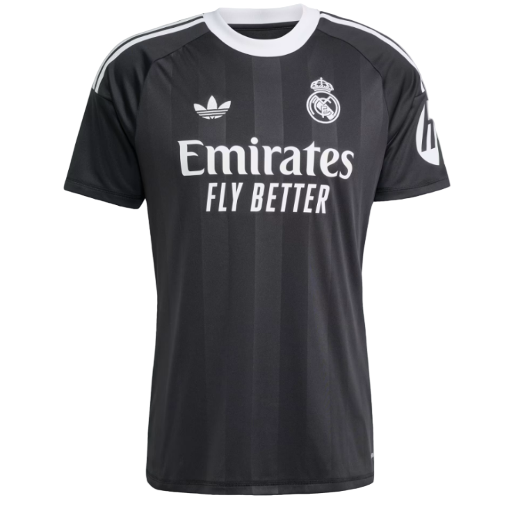 2E Black Real Madrid football jersey with Emirates Fly Better sponsor, white collar and club crest on the chest.
