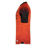 Orange short-sleeve sports jersey with black sleeve cuff, viewed from the side, showing a crest on the chest area.