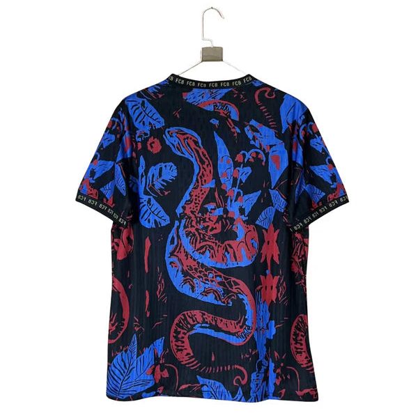 Black short-sleeve shirt on a hanger featuring a blue and red dragon and leaf pattern.