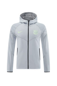 Light gray zip-front hoodie with hood, black zipper, neon Barça crest on the left chest and a neon Nike swoosh on the right chest area.