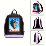 Purple and black backpack with a rectangular front display showing a hot air balloon scene in blue sky and red ground.