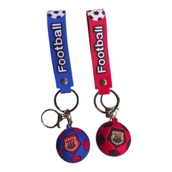 Pair of football-themed keychains on blue and red straps with soccer-ball ends and team crests