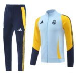 Split view of navy track pants with yellow stripes beside a light-blue Real Madrid track jacket with yellow sleeves on the right.